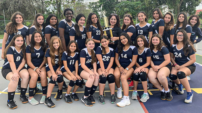 AMC Girls Volleyball 2019 20 Team picture after winning the championship trophy in the middle school league ISL 3