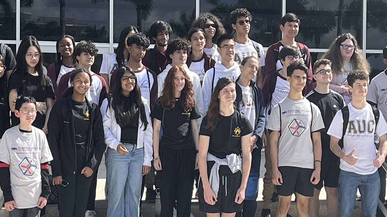 Advanced ArchiMath Our Mathematics Competitions Spirit at AMC & AUC FI